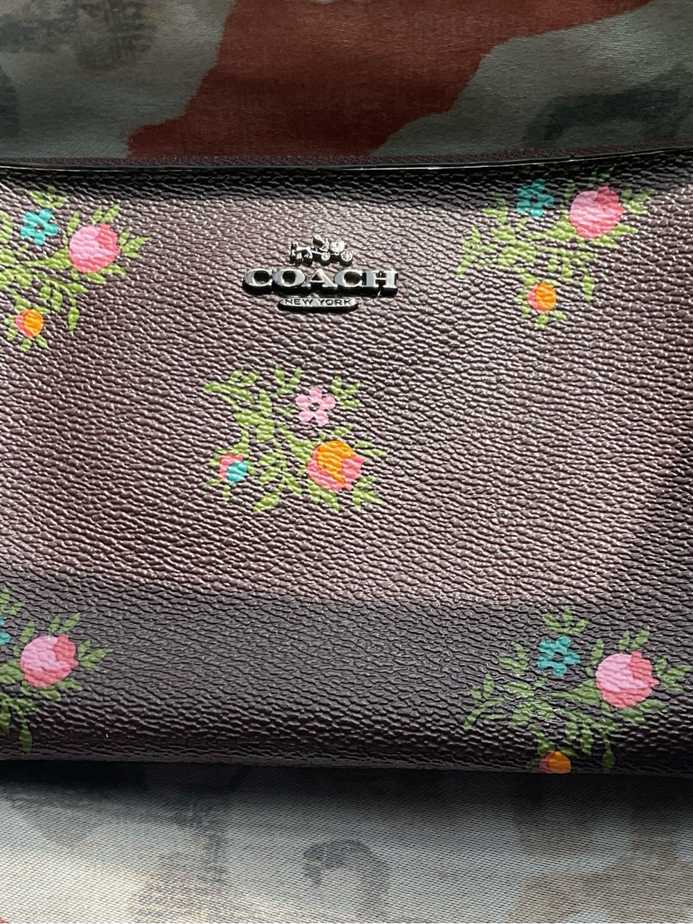 Coach Burgundy Pebbled Leather Clutch with Floral Print